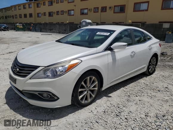 ✅ 2015 Hyundai Azera • VIN: KMHFG4JGXFA468082 • Lot: 69019715. Listed on Copart with 127,984 mi. Free auction sales archive from the USA and detailed vehicle history report at DreamBid. Image 1.