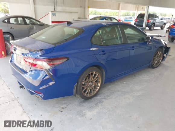 2023 Toyota Camry SE with VIN 4T1G11BK9PU091896, listed as a IAAI auction lot 42505987 with 75,683 mi miles and . Bid and sale history available at DreamBid. Image 4.