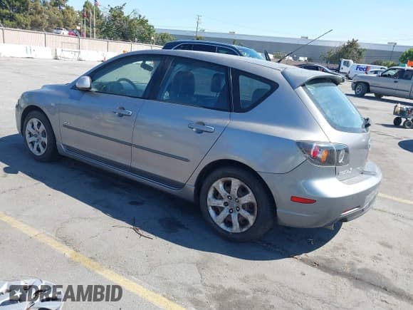 ✅ 2005 Mazda 3 s • VIN: JM1BK343751237434 • Lot: 42876724. Listed on IAAI with 258,658 mi. Free auction sales archive from the USA and detailed vehicle history report at DreamBid. Image 3.