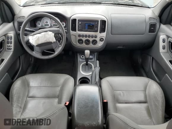 ✅ 2007 Ford Escape Hybrid • VIN: 1FMCU49H37KA33957 • Lot: 81960055. Wystawiony na Copart z przebiegiem 121 627 mil. Bezpłatny archiwum sprzedaży aukcyjnych z USA i szczegółowy raport historii pojazdu na DreamBid. Zdjęcie 8.