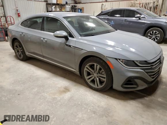 ✅ 2023 Volkswagen Arteon SEL R-Line • VIN: WVWSR7AN6PE014435 • Lot: 66212324. Listed on Copart with 28,901 mi. Free auction sales archive from the USA and detailed vehicle history report at DreamBid. Image 4.
