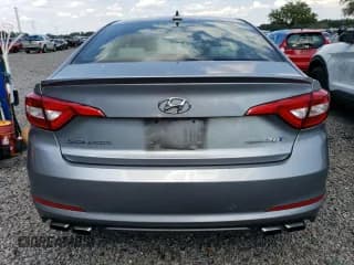 ✅ 2017 Hyundai Sonata Sport • VIN: 5NPE34AB7HH552565 • Lot: 52056263. Listed on Copart with 129,057 mi. Free auction sales archive from the USA and detailed vehicle history report at DreamBid. Image 6.