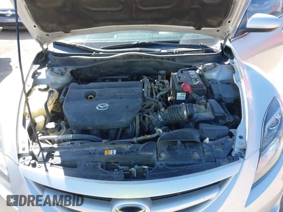 ✅ 2009 Mazda 6 i Touring • VIN: 1YVHP82A795M31562 • Lot: 41970484. Listed on IAAI with 128,724 mi. Free auction sales archive from the USA and detailed vehicle history report at DreamBid. Image 10.