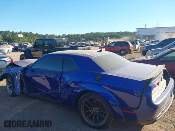 2022 Dodge Challenger SRT Hellcat with VIN 2C3CDZC92NH177608, listed as a IAAI auction lot 40596685 with 18,229 mi miles and . Bid and sale history available at DreamBid. Image 14.