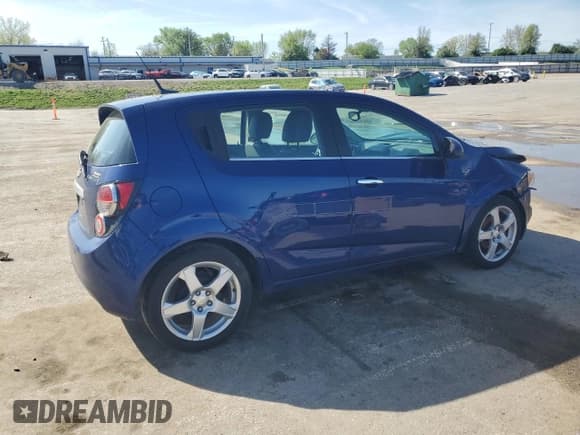 ✅ 2012 Chevrolet Sonic LTZ • VIN: 1G1JE6SH2C4211444 • Lot: 54013075. Listed on Copart with 97,378 mi. Free auction sales archive from the USA and detailed vehicle history report at DreamBid. Image 3.