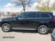 ✅ 2014 Mercedes-Benz GL 450 • VIN: 4JGDF7CE1EA342408 • Lot: 41968441. Listed on IAAI with 120,459 mi. Free auction sales archive from the USA and detailed vehicle history report at DreamBid. Image 14.