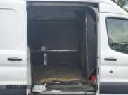 ✅ 2015 Ford Transit Cargo • VIN: 1FTNR3XM8FKB23144 • Lot: 56115225. Listed on Copart with 72,078 mi. Free auction sales archive from the USA and detailed vehicle history report at DreamBid. Image 11.