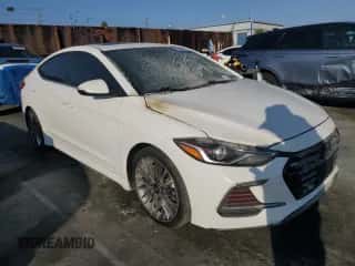 2018 Hyundai Elantra Sport z VIN KMHD04LB9JU704015, wystawiony jako Copart lot #90088295 z przebiegiem Nie podano mil oraz Nie do naprawy • Non repairable. Historia ofert i sprzedaży dostępna na DreamBid. Obrazek 4.