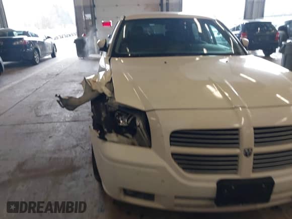 2006 Dodge Magnum SXT with VIN 2D4GZ47V56H344931, listed as a IAAI auction lot 41301668 with 132,916 mi miles and . Bid and sale history available at DreamBid. Image 6.