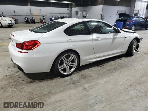 ✅ 2013 BMW 6 Series 650i xDrive • VIN: WBAYM1C58DDZ02671 • Лот: 59509955. Опубликован ранее на Copart с пробегом 76 630 миль. Бесплатный доступ к архиву аукционных продаж из США и подробный отчёт об истории автомобиля на DreamBid. Изображение 3.
