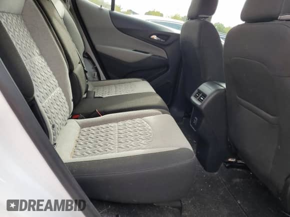 2022 Chevrolet Equinox LS z VIN 3GNAXSEV0NS243489, wystawiony jako Copart lot #82027315 z przebiegiem 71 897 mil mil oraz Szkoda całkowita • Salvage title. Historia ofert i sprzedaży dostępna na DreamBid. Obrazek 11.