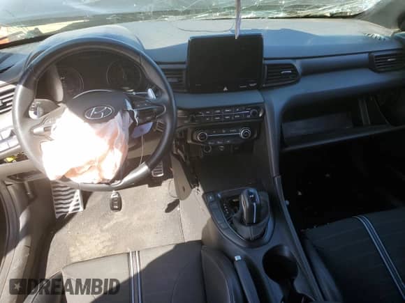 2021 Hyundai Veloster z VIN KMHT36AH0MU009139, wystawiony jako Copart lot #50110694 z przebiegiem Nie podano mil oraz Szkoda całkowita • Salvage title. Historia ofert i sprzedaży dostępna na DreamBid. Obrazek 8.