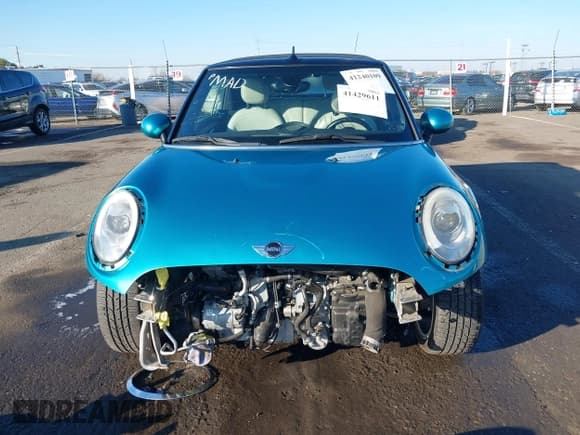 ✅ 2016 MINI Convertible • VIN: WMWWG5C50G3C19656 • Лот: 41429611. Опубликован ранее на IAAI с пробегом 60 873 миль. Бесплатный доступ к архиву аукционных продаж из США и подробный отчёт об истории автомобиля на DreamBid. Изображение 13.