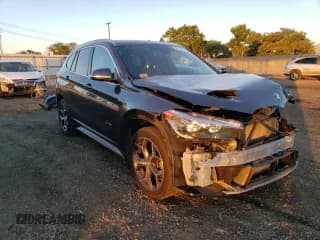 ✅ 2017 BMW X1 xDrive28i • VIN: WBXHT3C30H5F71865 • Lot: 67841122. Listed on Copart with 75,471 mi. Free auction sales archive from the USA and detailed vehicle history report at DreamBid. Image 4.