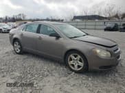 ✅ 2011 Chevrolet Malibu 1LS • VIN: 1G1ZB5E16BF360706 • Lot: 81413444. Listed on Copart with 135,830 mi. Free auction sales archive from the USA and detailed vehicle history report at DreamBid. Image 4.