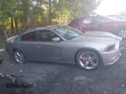 ✅ 2014 Dodge Charger Road/Track • VIN: 2C3CDXCT3EH122732 • Lot: 43109085. Listed on IAAI with 134,798 mi. Free auction sales archive from the USA and detailed vehicle history report at DreamBid. Image 13.