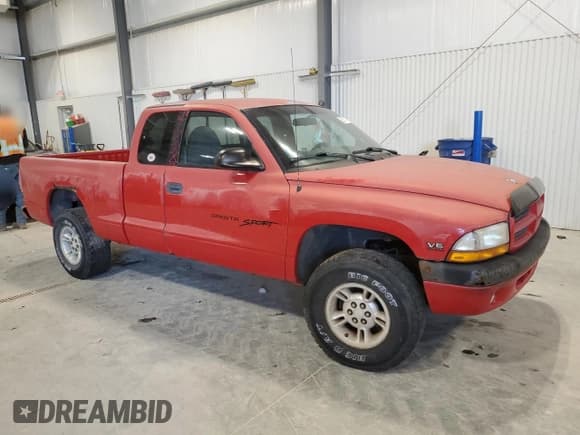 ✅ 1999 Dodge Dakota SLT • VIN: 1B7GG22X1XS295947 • Lot: 82611714. Wystawiony na Copart z przebiegiem Nie podano. Bezpłatny archiwum sprzedaży aukcyjnych z USA i szczegółowy raport historii pojazdu na DreamBid. Zdjęcie 4.