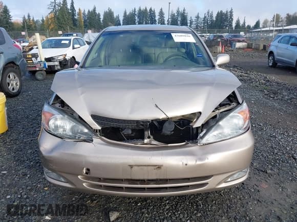 ✅ 2004 Toyota Camry LE • VIN: JTDBF30K240157853 • Лот: 43609826. Опубликован ранее на IAAI с пробегом 117 806 миль. Бесплатный доступ к архиву аукционных продаж из США и подробный отчёт об истории автомобиля на DreamBid. Изображение 13.