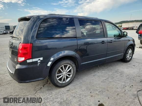 2014 Dodge Grand Caravan R/T with VIN 2C4RDGEG5ER472931, listed as a Copart auction lot 82223975 with 197,678 mi miles and Salvage title. Bid and sale history available at DreamBid. Image 3.