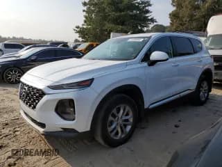 ✅ 2019 Hyundai Santa Fe SE • VIN: 5NMS2CAD6KH063886 • Lot: 67288084. Wystawiony na Copart z przebiegiem 100 332 mil. Bezpłatny archiwum sprzedaży aukcyjnych z USA i szczegółowy raport historii pojazdu na DreamBid. Zdjęcie 1.