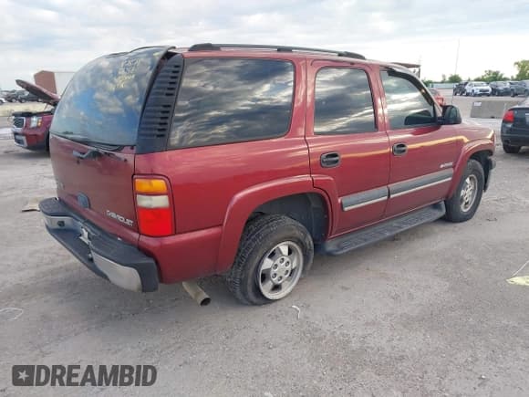 ✅ 2003 Chevrolet Tahoe LS • VIN: 1GNEC13V03R310084 • Lot: 42187078. Listed on IAAI with 217,863 mi. Free auction sales archive from the USA and detailed vehicle history report at DreamBid. Image 4.