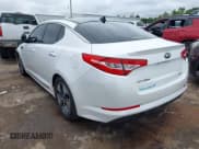 ✅ 2012 Kia Optima Hybrid • VIN: KNAGM4AD2C5035784 • Lot: 43102923. Listed on IAAI with 92,734 mi. Free auction sales archive from the USA and detailed vehicle history report at DreamBid. Image 3.