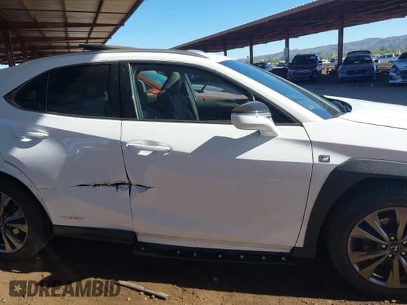 ✅ 2019 Lexus UX 250h • VIN: JTHU9JBH3K2003707 • Lot: 43560505. Wystawiony na IAAI z przebiegiem 42 005 mil. Bezpłatny archiwum sprzedaży aukcyjnych z USA i szczegółowy raport historii pojazdu na DreamBid. Zdjęcie 13.