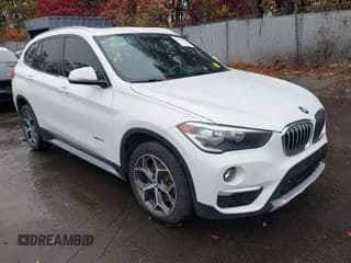 ✅ 2018 BMW X1 xDrive28i • VIN: WBXHT3C37J5K23998 • Lot: 43627488. Listed on IAAI with 153,000 mi. Free auction sales archive from the USA and detailed vehicle history report at DreamBid. Image 1.