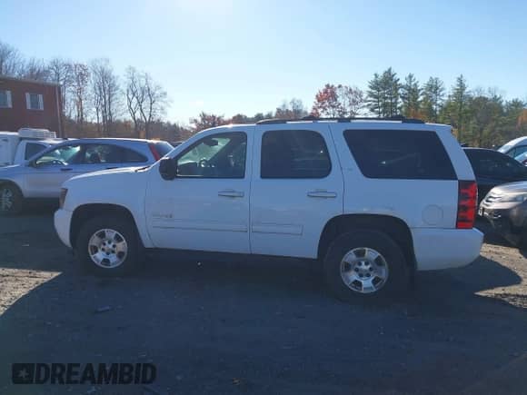 2011 Chevrolet Tahoe LT z VIN 1GNSKBE03BR108187, wystawiony jako IAAI lot #43624016 z przebiegiem 222 436 mil mil oraz . Historia ofert i sprzedaży dostępna na DreamBid. Obrazek 14.