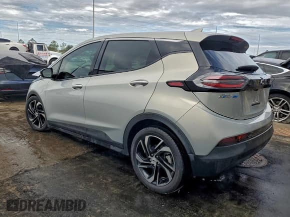 ✅ 2023 Chevrolet Bolt EV 2LT • VIN: 1G1FX6S02P4197979 • Lot: 94758415. Wystawiony na Copart z przebiegiem 10 790 mil. Bezpłatny archiwum sprzedaży aukcyjnych z USA i szczegółowy raport historii pojazdu na DreamBid. Zdjęcie 2.