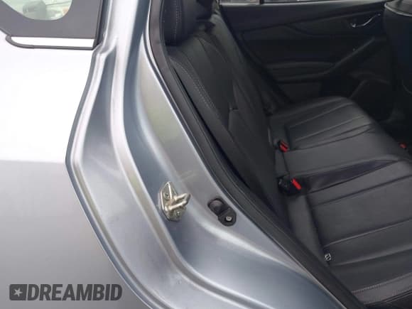 ✅ 2018 Subaru Impreza Limited • VIN: 4S3GTAT65J3731857 • Lot: 42199163. Listed on IAAI with 62,621 mi. Free auction sales archive from the USA and detailed vehicle history report at DreamBid. Image 8.