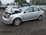 ✅ 2005 Suzuki Forenza LX • VIN: KL5JJ56Z85K132557 • Lot: 80202535. Wystawiony na Copart z przebiegiem Nie podano. Bezpłatny archiwum sprzedaży aukcyjnych z USA i szczegółowy raport historii pojazdu na DreamBid. Zdjęcie 1.