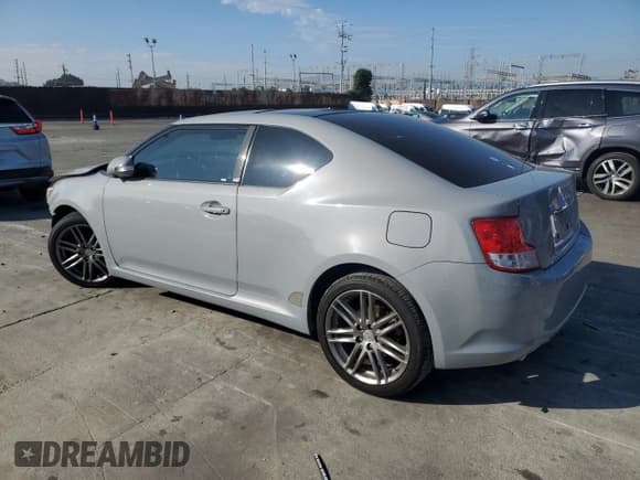 ✅ 2012 Scion tC • VIN: JTKJF5C7XC3035696 • Лот: 82638675. Опубликован ранее на Copart с пробегом 93 537 миль. Бесплатный доступ к архиву аукционных продаж из США и подробный отчёт об истории автомобиля на DreamBid. Изображение 2.