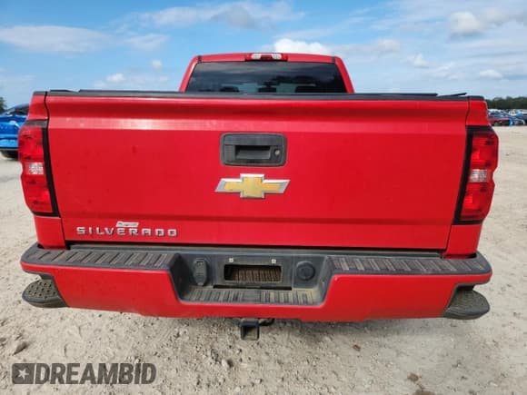 ✅ 2018 Chevrolet Silverado 1500 Custom • VIN: 1GCVKPEC3JZ217082 • Лот: 84786065. Опубликован ранее на Copart с пробегом 128 562 миль. Бесплатный доступ к архиву аукционных продаж из США и подробный отчёт об истории автомобиля на DreamBid. Изображение 6.