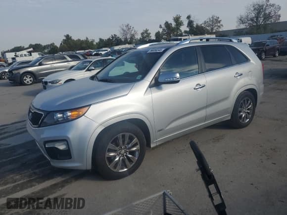✅ 2012 Kia Sorento SX • VIN: 5XYKWDA26CG285770 • Лот: 86550245. Опубликован ранее на Copart с пробегом 147 611 миль. Бесплатный доступ к архиву аукционных продаж из США и подробный отчёт об истории автомобиля на DreamBid. Изображение 1.