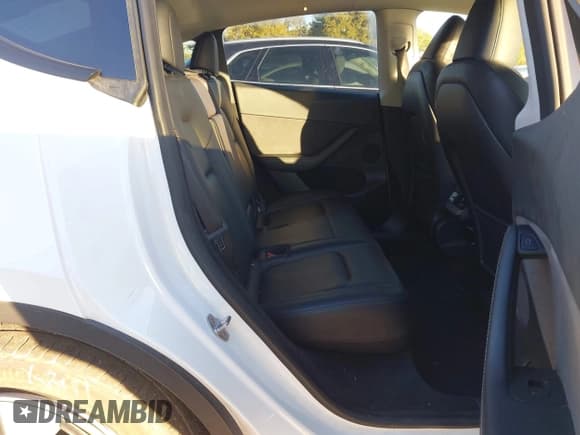 ✅ 2023 Tesla Model Y Long Range • VIN: 7SAYGDEE2PA058634 • Lot: 43570934. Listed on IAAI with 40,478 mi. Free auction sales archive from the USA and detailed vehicle history report at DreamBid. Image 8.