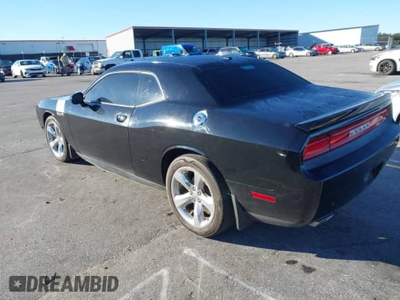 2012 Dodge Challenger R/T Plus with VIN 2C3CDYBT9CH275359, listed as a IAAI auction lot 43595746 with 182,928 mi miles and . Bid and sale history available at DreamBid. Image 3.