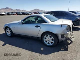 ✅ 2000 Mercedes-Benz SLK 230 Kompressor • VIN: WDBKK47F8YF154709 • Лот: 65714625. Опубликован ранее на Copart с пробегом 157 682 миль. Бесплатный доступ к архиву аукционных продаж из США и подробный отчёт об истории автомобиля на DreamBid. Изображение 2.