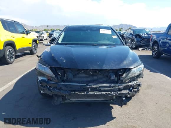 2023 Toyota Camry SE with VIN 4T1G11BK2PU105668, listed as a IAAI auction lot 43013320 with 39,694 mi miles and . Bid and sale history available at DreamBid. Image 6.