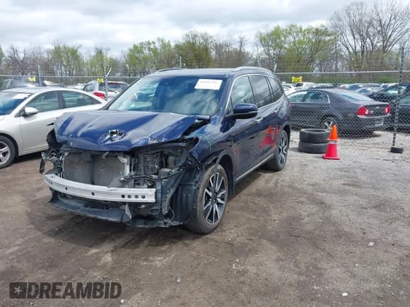 ✅ 2019 Honda Pilot Touring 7-Passenger • VIN: 5FNYF6H68KB001978 • Lot: 42091795. Listed on IAAI with 129,145 mi. Free auction sales archive from the USA and detailed vehicle history report at DreamBid. Image 17.