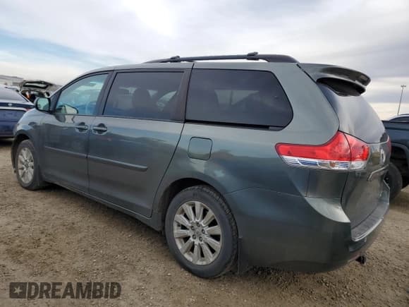 ✅ 2012 Toyota Sienna LE • VIN: 5TDJK3DC7CS039741 • Lot: 91675575. Listed on Copart with 215,437 mi. Free auction sales archive from the USA and detailed vehicle history report at DreamBid. Image 2.