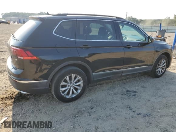 ✅ 2018 Volkswagen Tiguan SEL • VIN: 3VV3B7AX9JM071256 • Lot: 68310755. Listed on Copart with 96,429 mi. Free auction sales archive from the USA and detailed vehicle history report at DreamBid. Image 3.