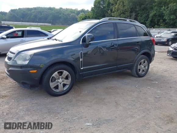 2015 Chevrolet Captiva Sport LS z VIN 3GNAL2EK8FS504113, wystawiony jako IAAI lot #43040886 z przebiegiem 176 003 mil mil oraz . Historia ofert i sprzedaży dostępna na DreamBid. Obrazek 2.