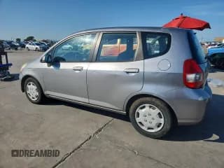 ✅ 2007 Honda Fit • VIN: JHMGD37437S045265 • Lot: 90327835. Listed on Copart with 254,260 mi. Free auction sales archive from the USA and detailed vehicle history report at DreamBid. Image 2.