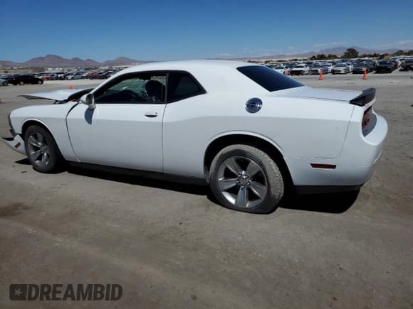 ✅ 2013 Dodge Challenger SXT • VIN: 2C3CDYAG0DH596373 • Lot: 68378504. Wystawiony na Copart z przebiegiem Nie podano. Bezpłatny archiwum sprzedaży aukcyjnych z USA i szczegółowy raport historii pojazdu na DreamBid. Zdjęcie 2.