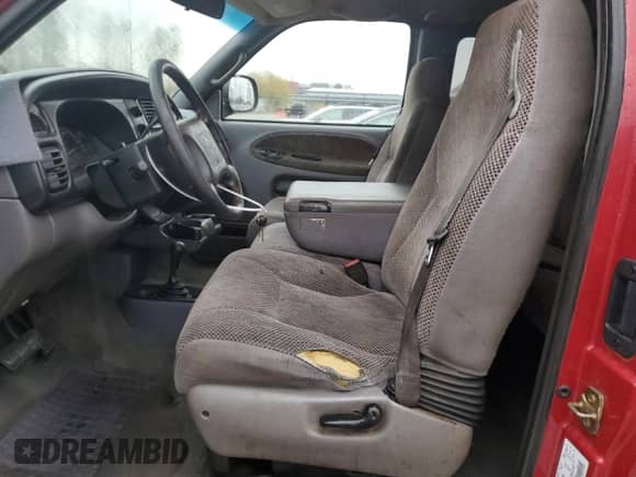 1999 Dodge 1500 z VIN 3B7HF13Z3XG204850, wystawiony jako Copart lot #78824704 z przebiegiem 274 493 mil mil oraz Szkoda całkowita • Salvage title. Historia ofert i sprzedaży dostępna na DreamBid. Obrazek 7.