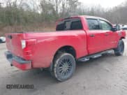 ✅ 2022 Nissan Titan Platinum Reserve • VIN: 1N6AA1FB5NN103034 • Lot: 41177605. Listed on IAAI with 71,657 mi. Free auction sales archive from the USA and detailed vehicle history report at DreamBid. Image 4.