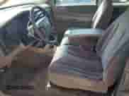 2002 Dodge Dakota Sport z VIN 1B7GL32XX2S588725, wystawiony jako Copart lot #65541345 z przebiegiem 205 568 mil mil oraz Szkoda całkowita • Salvage title. Historia ofert i sprzedaży dostępna na DreamBid. Obrazek 7.