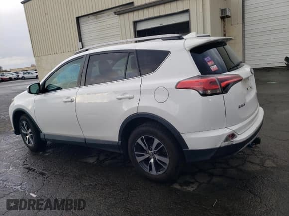 ✅ 2018 Toyota RAV4 XLE • VIN: 2T3RFREV5JW787345 • Лот: 82752895. Опубликован ранее на Copart с пробегом 94 364 миль. Бесплатный доступ к архиву аукционных продаж из США и подробный отчёт об истории автомобиля на DreamBid. Изображение 2.