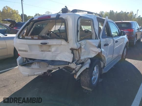 ✅ 2009 Ford Escape XLT • VIN: 1FMCU03G59KB61676 • Lot: 43421435. Wystawiony na IAAI z przebiegiem 257 849 mil. Bezpłatny archiwum sprzedaży aukcyjnych z USA i szczegółowy raport historii pojazdu na DreamBid. Zdjęcie 6.